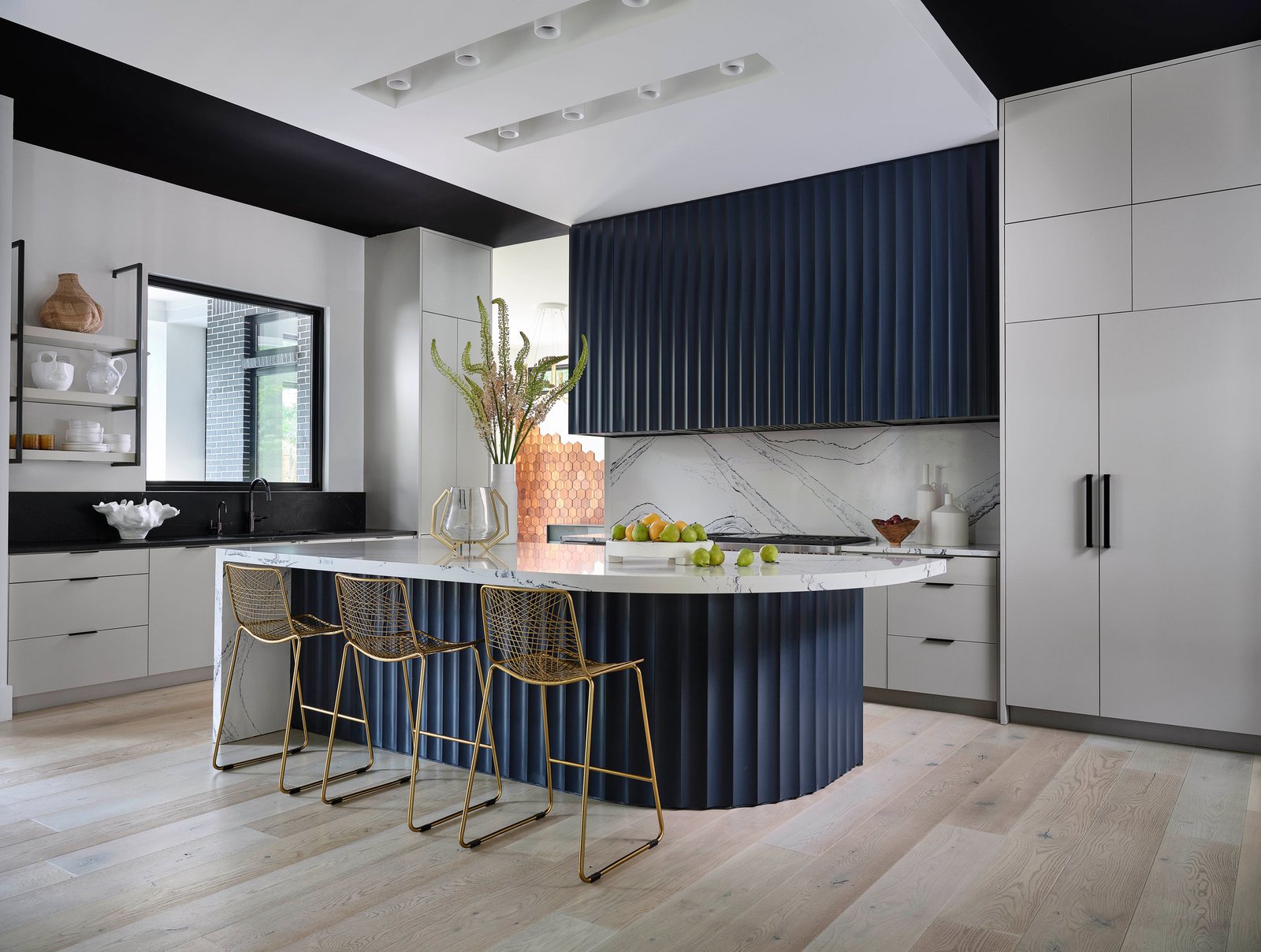 Kitchen of The Dogwood Residence from the dining side.